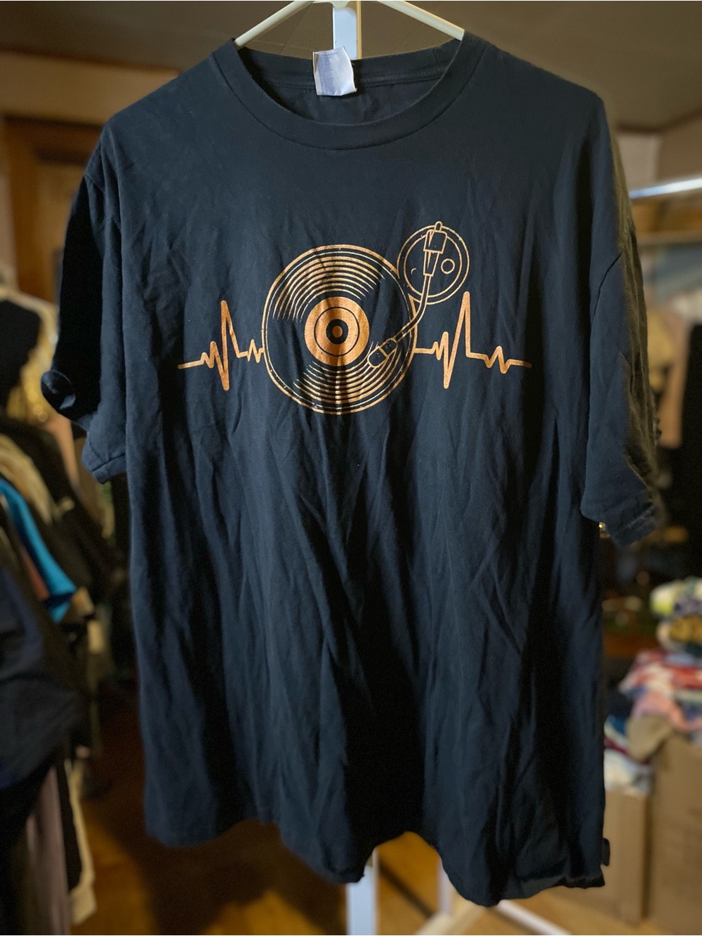Port and Company Black Tee with Gold Vinyl Record Heartbeat Graphic